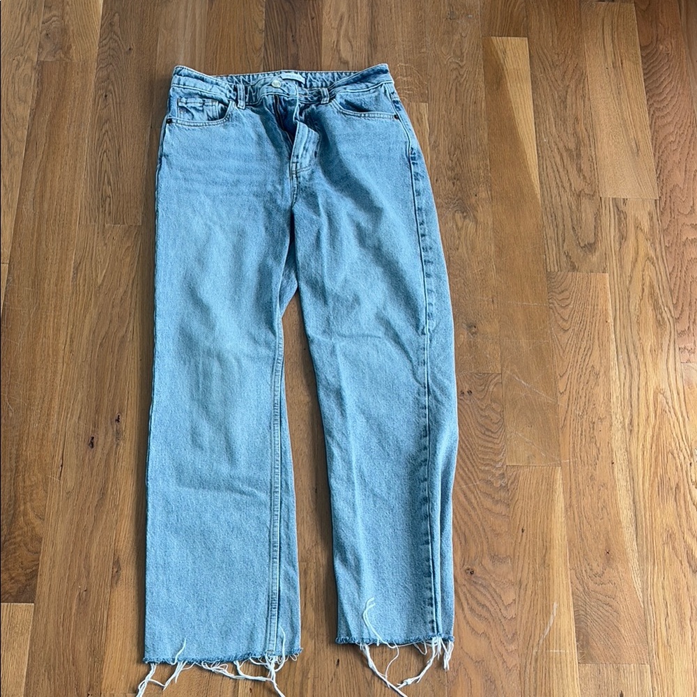 Distressed Light Blue Jeans